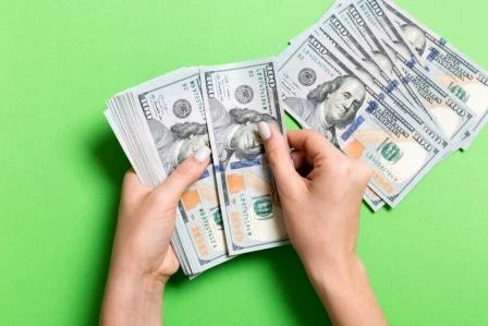 green-money-wad-compressed.jpeg