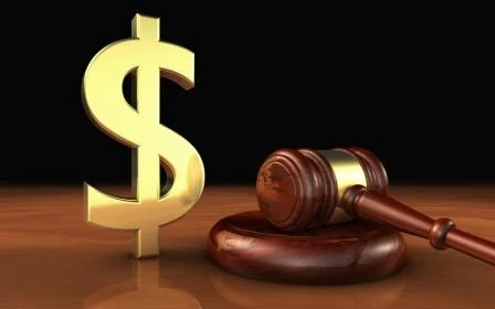 gavel-with-money-compressed.jpeg