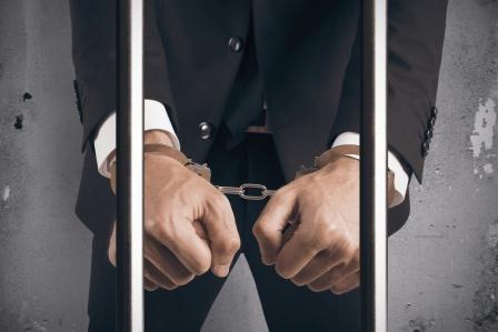 handcuff-businessman-compressed.jpeg